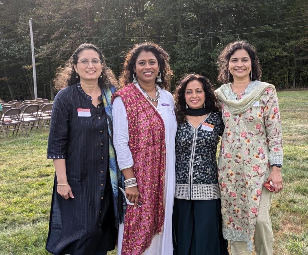 Community members in traditional attire celebrating culture